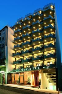 a hotel with lights on the side of it at Centrotel Hotel in Athens