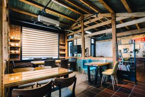 Restaurant o un lloc per menjar a 似禾苑民宿 Siheyuan Homestay