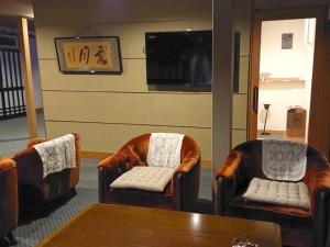 a waiting room with two chairs and a table at Cooking inn Kagetsu - Vacation STAY 88535 in Kuradani