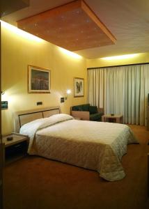 Ένα ή περισσότερα κρεβάτια σε δωμάτιο στο Centrotel Hotel 