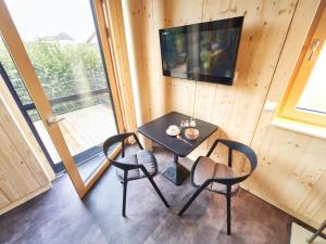 TV a/nebo společenská místnost v ubytování ZiKK Apartment Vitis