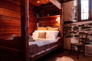 Postel nebo postele na pokoji v ubytování Chez Bear