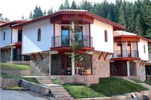 a large house with at Ski Villa in Pamporovo Forest in Pamporovo
