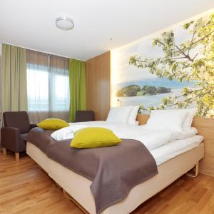 Postel nebo postele na pokoji v ubytování Thon Hotel Surnadal