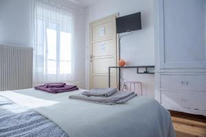 Posteľ alebo postele v izbe v ubytovaní B&B Giardini dell'Ardo