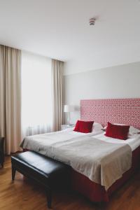 Ένα ή περισσότερα κρεβάτια σε δωμάτιο στο Elite Hotel Mollberg