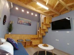 Televízia a/alebo spoločenská miestnosť v ubytovaní Villa Croatia Sea View with heated pool