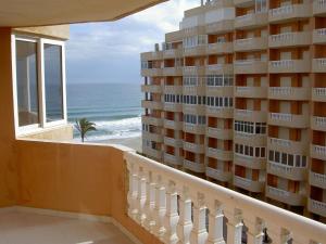 a balcony with a view of the ocean at APCOSTAS - Hawaii Sun in La Manga del Mar Menor