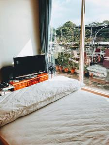 Letto o letti in una camera di Yun Ting Orchid Garden