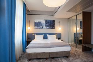 Posteľ alebo postele v izbe v ubytovaní Hotel Unicus Krakow Old Town - Destigo Hotels