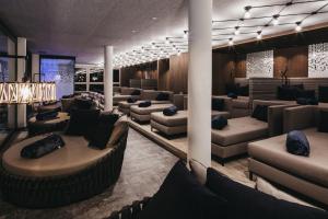 Гостиная зона в Hotel Tirolerhof 4 Sterne Superior