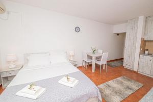 Postel nebo postele na pokoji v ubytování Open Sky Apartments