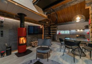 Kuchyň nebo kuchyňský kout v ubytování Levikaira Apartments - Log Cabins