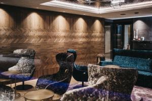 Гостиная зона в Hotel Tirolerhof 4 Sterne Superior