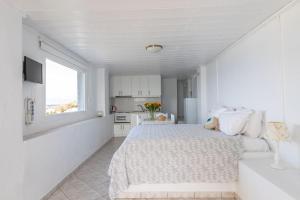 Kuchyň nebo kuchyňský kout v ubytování Sea Wind Apartments