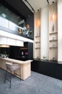 Kuchyň nebo kuchyňský kout v ubytování Hotel NuVe Elements