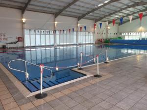 a large swimming pool in a large building at 720 Holiday Resort Unity, Brean in Brean