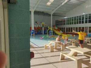 a group of people in a gym with a playground at 720 Holiday Resort Unity, Brean in Brean