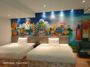 Postel nebo postele na pokoji v ubytování Legend Hotel Kaohsiung Pier2