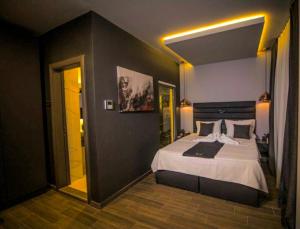 a bedroom with a large bed in a room at International Palace in Veles