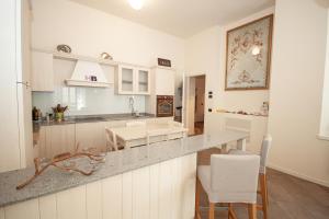 A kitchen or kitchenette at Casa Julia - Menaggio by LoveComo