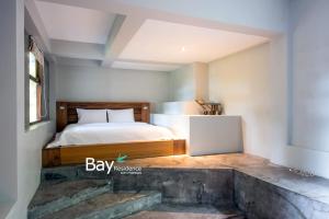 Ein Bett oder Betten in einem Zimmer der Unterkunft Bay Villas Koh Phangan
