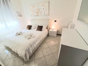 Posteľ alebo postele v izbe v ubytovaní Appartamento Diamantina