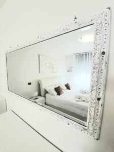 Posteľ alebo postele v izbe v ubytovaní Appartamento Diamantina