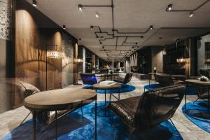 Гостиная зона в Hotel Tirolerhof 4 Sterne Superior