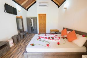 Postel nebo postele na pokoji v ubytování Sabba Beach Suite , Fodhdhoo - Maldives