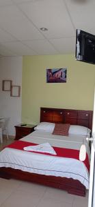 Postel nebo postele na pokoji v ubytování Hotel Los Estoraques