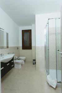 Kylpyhuone majoituspaikassa Oasi Guzzetta Hotel