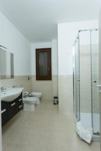 Kúpeľňa v ubytovaní Oasi Guzzetta Hotel&Case Vacanze