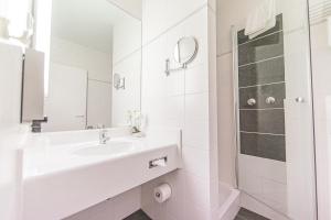Koupelna v ubytování PLAZA Hotel Hanau