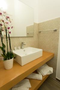 Koupelna v ubytování Oasi Guzzetta Hotel&Case Vacanze