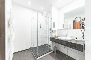 Koupelna v ubytování PLAZA Hotel Hanau