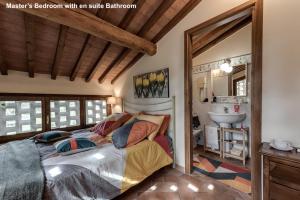 Posteľ alebo postele v izbe v ubytovaní Agriturismo Rigone in Chianti