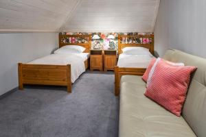 Posteľ alebo postele v izbe v ubytovaní Hotel Zalesie