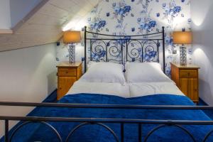 Posteľ alebo postele v izbe v ubytovaní Hotel Zalesie