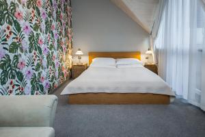 Posteľ alebo postele v izbe v ubytovaní Hotel Zalesie