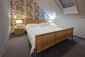 Posteľ alebo postele v izbe v ubytovaní Hotel Zalesie