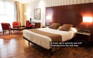 Cama o camas de una habitación en Zenit Lleida