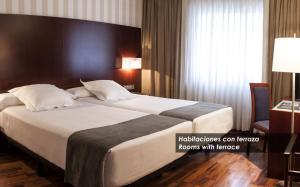 Postel nebo postele na pokoji v ubytování Zenit Málaga