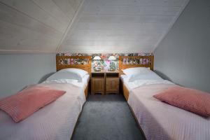 Posteľ alebo postele v izbe v ubytovaní Hotel Zalesie