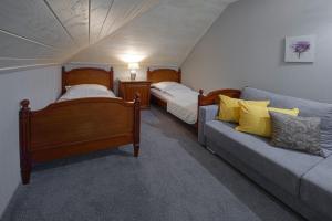 Posteľ alebo postele v izbe v ubytovaní Hotel Zalesie
