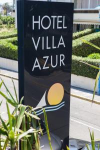a sign for a hotel villa zermatt at Villa Azur in Villeneuve-Loubet