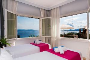 Posteľ alebo postele v izbe v ubytovaní Corfu Sea View Villa - Cleo
