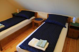 Postel nebo postele na pokoji v ubytování Chata Zimnik, ruska bania