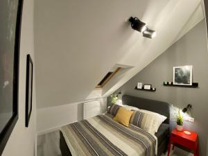 Postelja oz. postelje v sobi nastanitve Ski Sun Sea - Rodzinny apartament pod gondolą