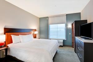 Home2 Suites By Hilton Turlock, Ca客房内的一张或多张床位